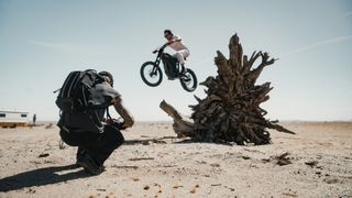 The PolarPro RoadRunner Backpack worn by a photographer photographing motocross