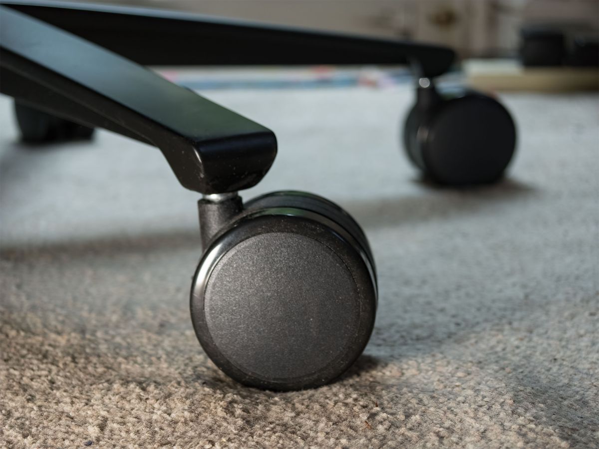 Closeup of the Arozzi Vernazza Supersoft gaming chair's wheels