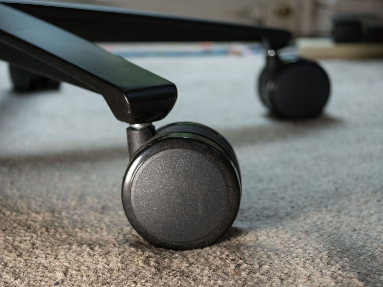 Closeup of the Arozzi Vernazza Supersoft gaming chair's wheels