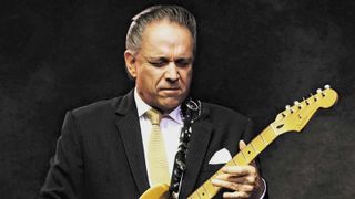 A familiar sight: Jimmie Vaughan with a Fender Strat