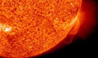 This image is a close-up on the snake-like solar filament arcing up from the sun as seen by NASA's Solar Dynamics Observatory on Nov. 17, 2010.