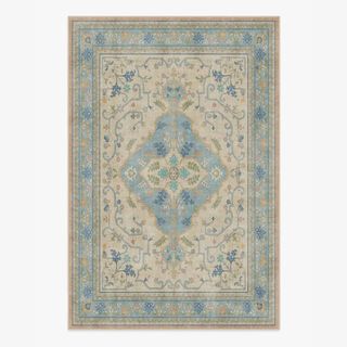 Blue and ivory patterned rectangular rug