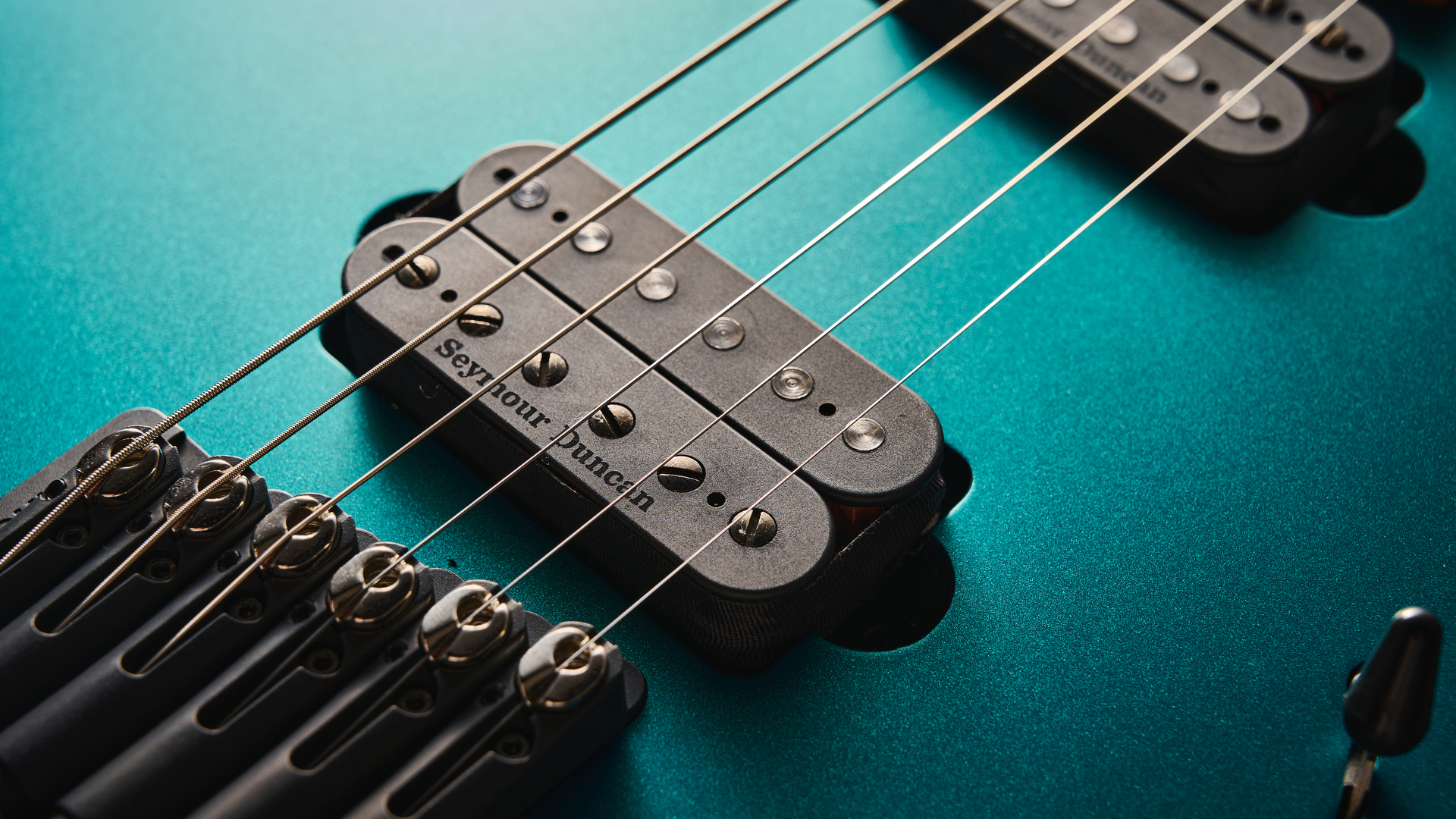 Strandberg N2 Boden Standard in Transformative Teal, shot in close-up and against a pale wooden floor.