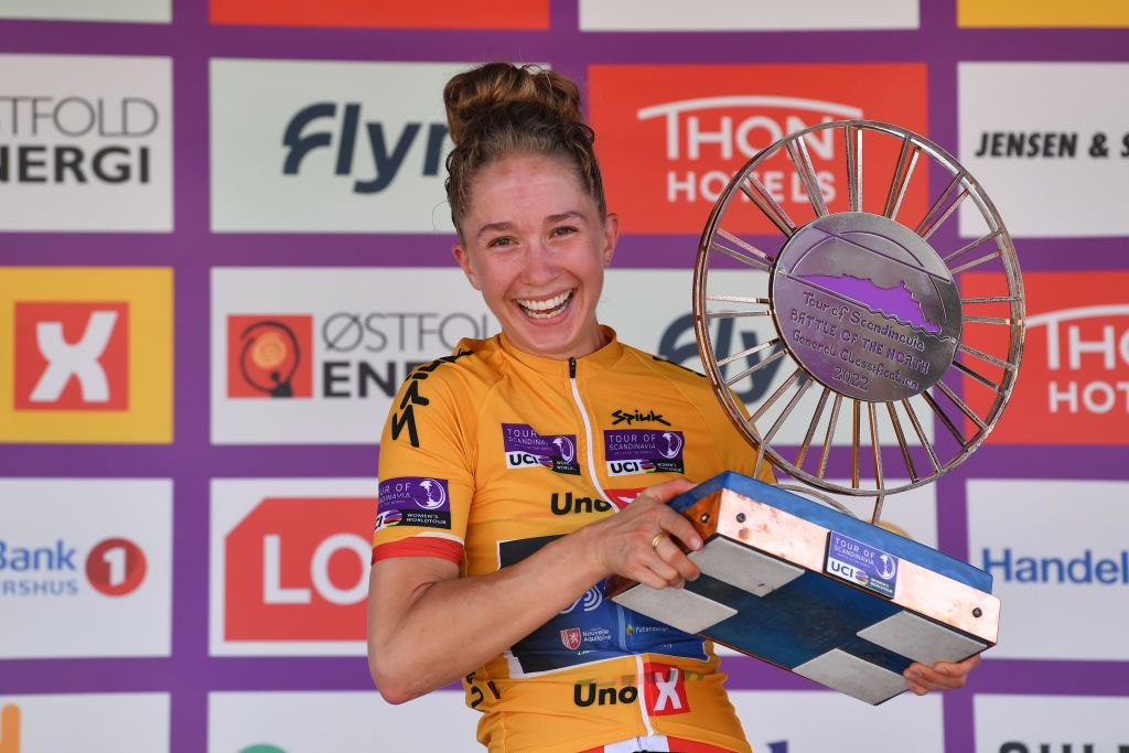 HALDEN NORWAY AUGUST 14 Cecilie Uttrup Ludwig of Denmark and Team FDJ Nouvelle Aquitaine Futuroscope Yellow Leader Jersey celebrates at podium as final overall winner during the 8th Tour of Scandinavia 2022 Battle Of The North Stage 6 a 1543km stage from Lillestrm to Halden UCIWWT tourofscandinavia TOSC22 on August 14 2022 in Halden Norway Photo by Luc ClaessenGetty Images