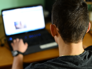 man at computer