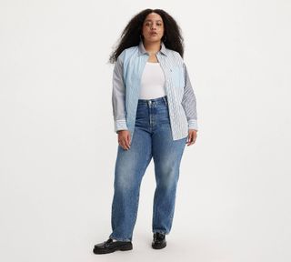 mdoel wears ,501® '81 WOMEN'S JEANS and button down shirt with loafers