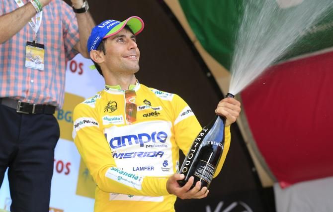 Tour of Poland leader Diego Ulissi (Lampre-Merida) lets loose with the bubbly