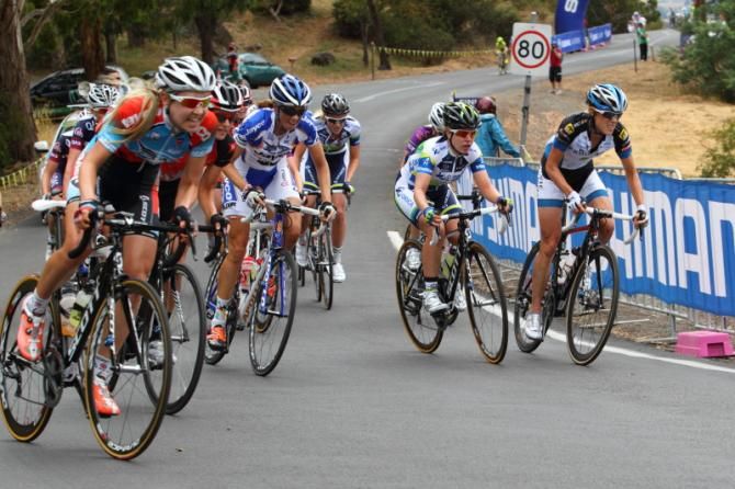 At the top of the climb, various riders accelerated after Corset