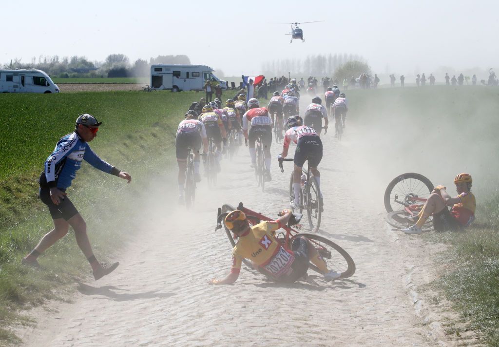 ROUBAIX FRANCE APRIL 16 Susanne Andersen of Norway and UnoX Women Cycling Team crashes in a cobblestones sector during the 2nd ParisRoubaix 2022 Womens Elite a 1247km one day race from Denain to Roubaix ParisRoubaixFemmes ParisRoubaix on April 16 2022 in Roubaix France Photo by Etienne Garnier PoolGetty Images