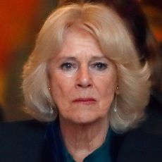 Queen Camilla looks tearful and has blonde hair