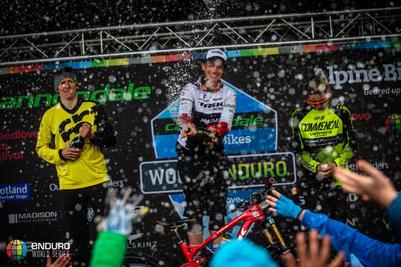 The women's podium sprays the champagne
