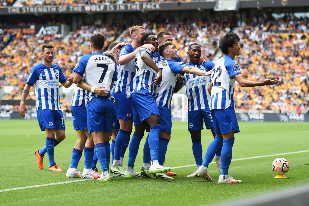 Kaoru Mitoma of Brighton &amp; Hove Albion celebrates with teammates after scoring the team&#039;s first goal during the Premier League match between Wolverhampton Wanderers and Brighton &amp; Hove Albion at Molineux on August 19, 2023 in Wolverhampton, England. (Photo by Harriet Lander/Getty Images)