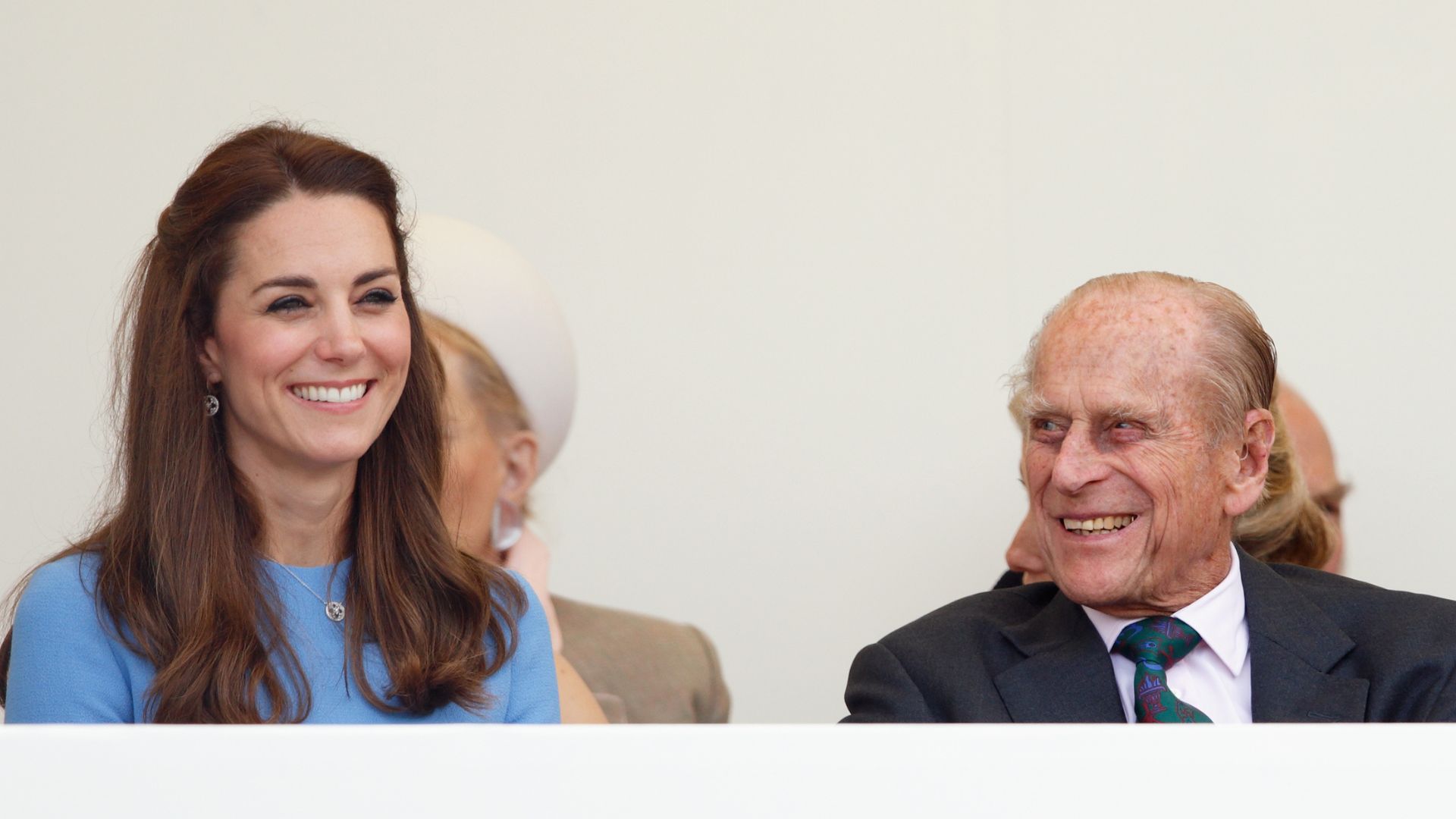 Kate Middleton and Prince Philip watch a parade as they attend 'The Patron's Lunch' celebrations to mark Queen Elizabeth II's 90th birthday on The Mall on June 12, 2016