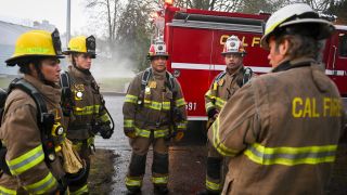 From left to right: Gabriela, Audrey, Eve, Jake and Vince all in fire gear in Fire Country.