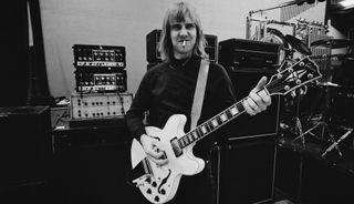 Alex Lifeson plays his white Gibson ES-355 guitar during a soundcheck ahead of Rush's gig at Bingley Hall in Stafford, Staffordshire, England on September 21, 1979