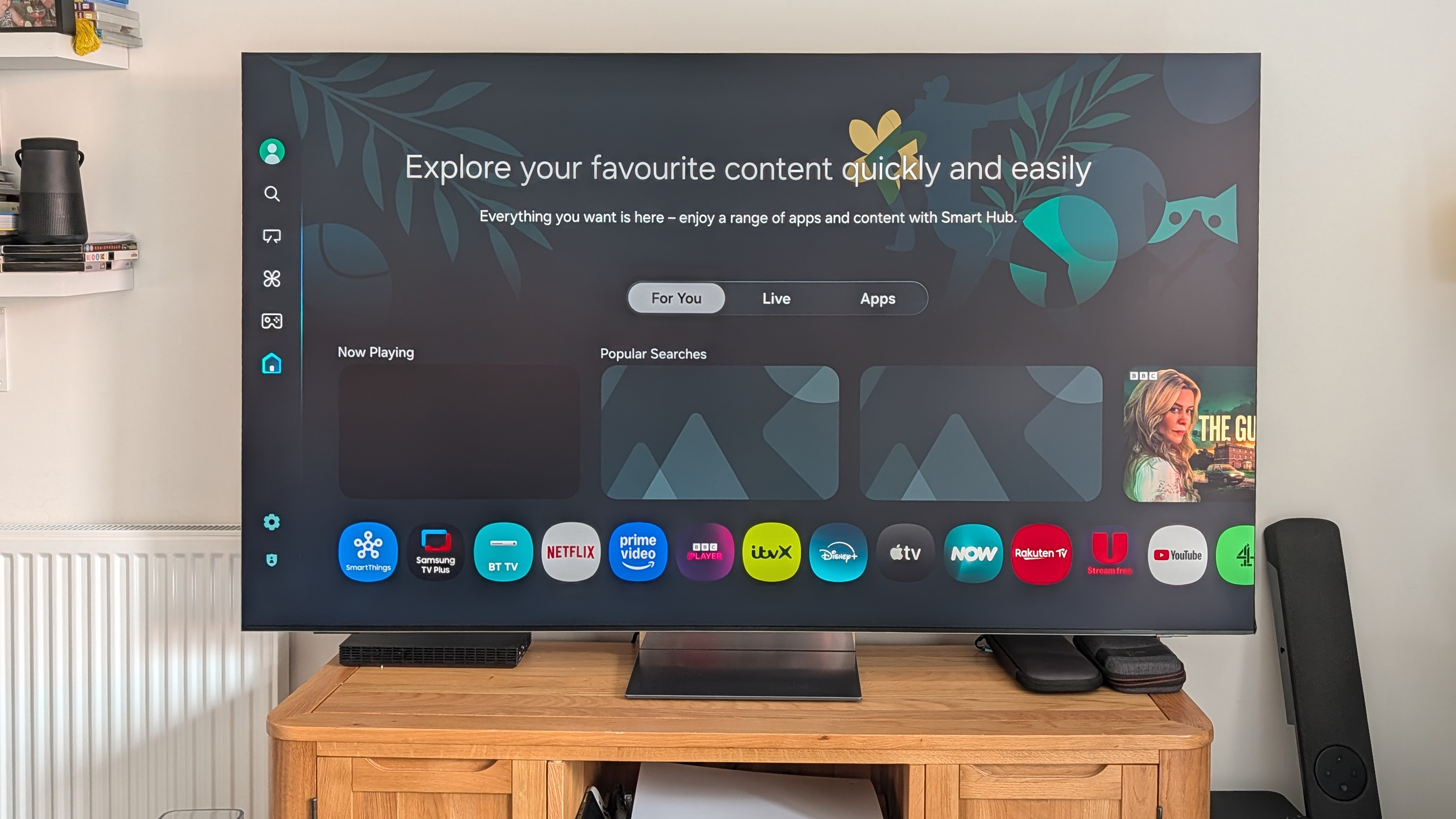 Samsung QN990F 8K TV in 75-inch living room setup