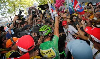 Peter Sagan greets Slovakian fans in Berne at the Tour de France.