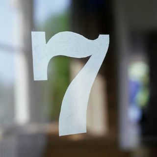 number 7 stencil on glass