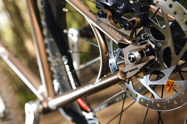Track-style rear facing slot dropouts keep chain tension