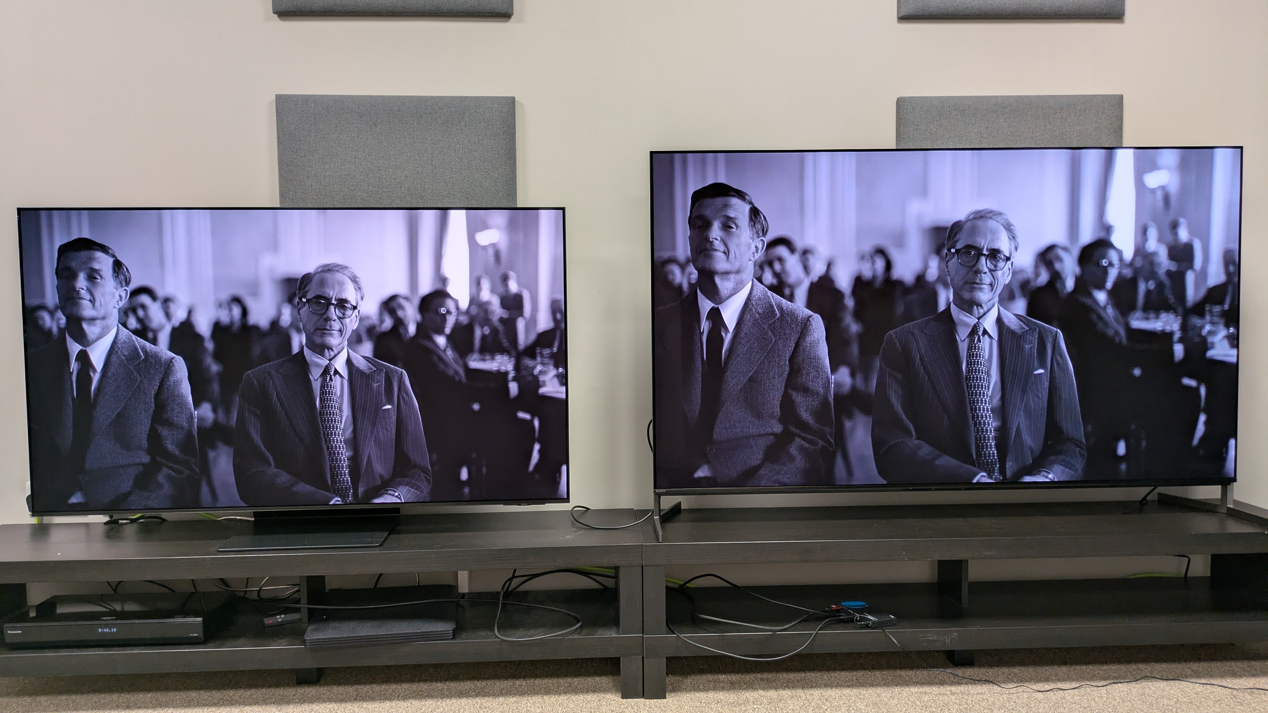 Samsung S95F (left) and Sony Bravia 8 II (right) with Admiral Strauss from Oppenheimer on screen