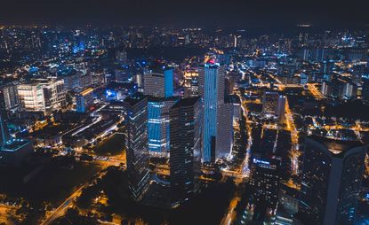 An aerial view of the DUO complex photographed at night using a drone from the sky