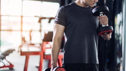 Man lifting dumbbells