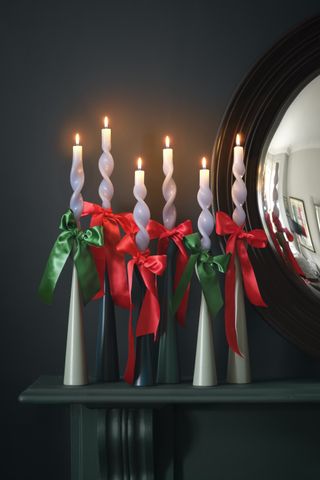 Candles with Christmas bows