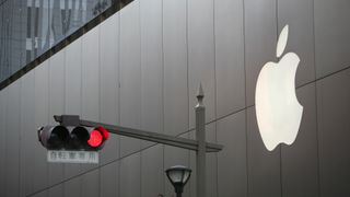 Apple logo on the side of a building