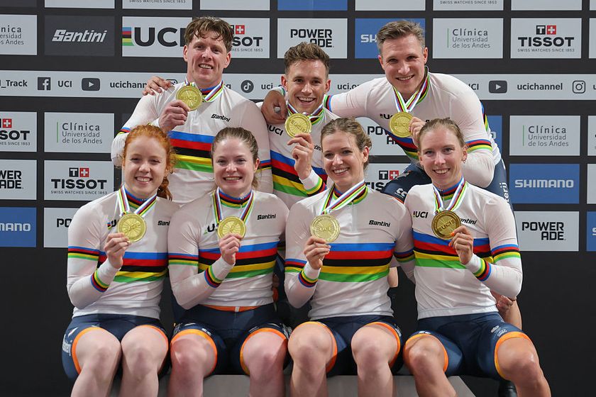 (Top L-R) Netherlands&#039; #169 Roy Van der Berg, #168 Harrie Lavreysen, Netherlands&#039; #166 Jeffrey Hoogland; (Bottom L-R) #122 Hetty Van de Wouw, #123 Steffie Van der Peet, #121 Kimberly Kalee, and #34 Lorena Wiebes celebrate during the scratch and team sprint award ceremony at the 2025 UCI Track World Championships, in the Penalolen Velodrome in Santiago, on October 22, 2025. (Photo by Javier TORRES / AFP)