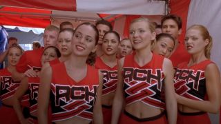 Kirsten Dunst and the whole cheer squad about to take the stage in Bring it On.