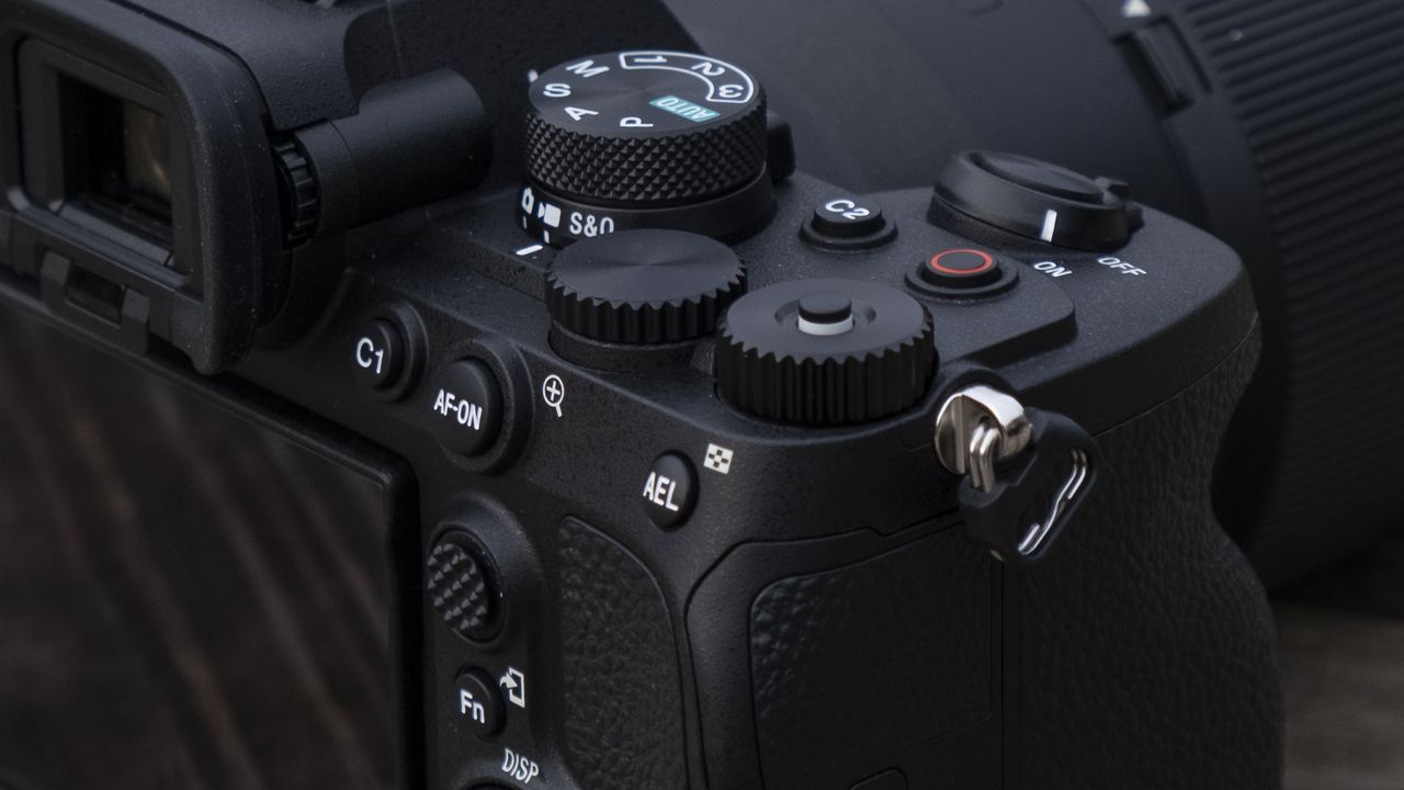 The Sony A7 IV camera's top dials and controls