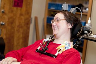 quadriplegic uses mind-controlled prosthetic