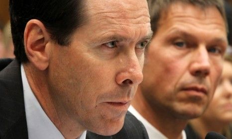 AT&amp;amp;T boss Randall Stephenson (left) during a hearing in May regarding the proposed AT&amp;amp;T and T-Mobile merger, which was blocked Wednesday by a DOJ lawsuit.