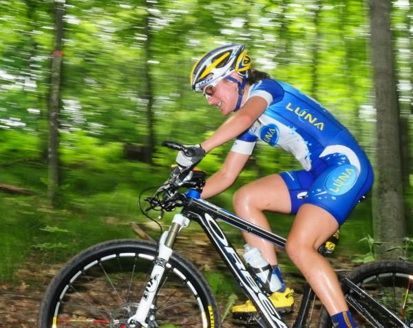 Amy Dombroski (Luna Pro Team) flying up the mountain.