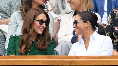 london, england july 13 catherine, duchess of cambridge and meghan, duchess of sussex in the royal box on centre court during day twelve of the wimbledon tennis championships at all england lawn tennis and croquet club on july 13, 2019 in london, england photo by karwai tanggetty images