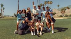 The Bad Birdie team standing on a golf green in their golf clothing