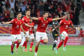 Al-Ahly players celebrate victory over Raja Casablanca in the CAF Super Cup in December 2021.