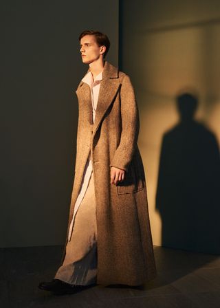 Model wearing long coat
