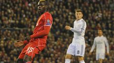 Mario Balotelli watches his shot go wide of the goal during match between Liverpool and Real Madrid at Anfield in Liverpool