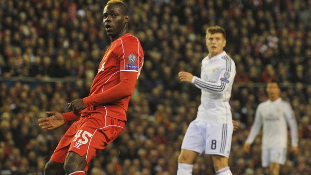 Mario Balotelli watches his shot go wide of the goal during match between Liverpool and Real Madrid at Anfield in Liverpool