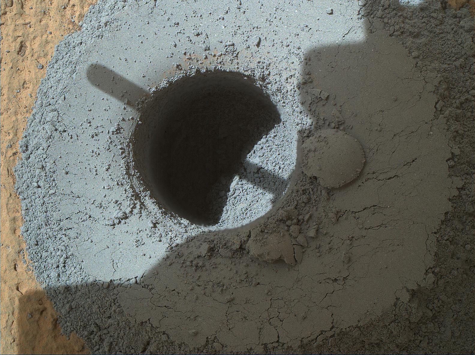 NASA&#039;s Mars rover Curiosity drilled this sample-collecting hole into a rock called Telegraph Peak on Feb. 24, 2015.