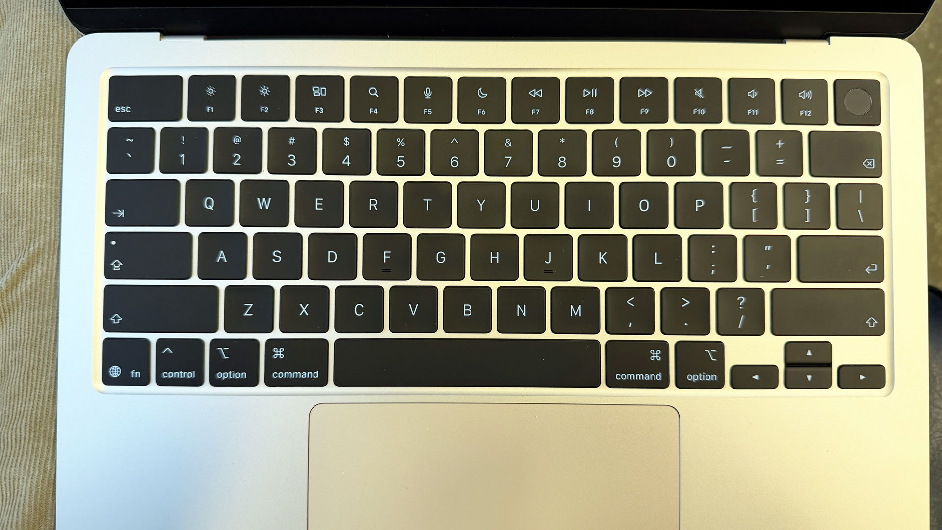 MacBook Air keyboards compared to iOS keyboard and each other