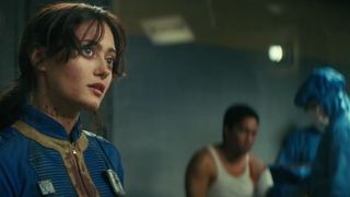 Lucy (Ella Purnell) seen speaking to Birdie whilst Maximus (Aaron Moten) is attended to by Vault 4 doctors in Fallout episode 6.