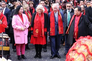 Prince Charles, Prince of Wales and Camilla, Duchess of Cornwall observe some New Year Lions
