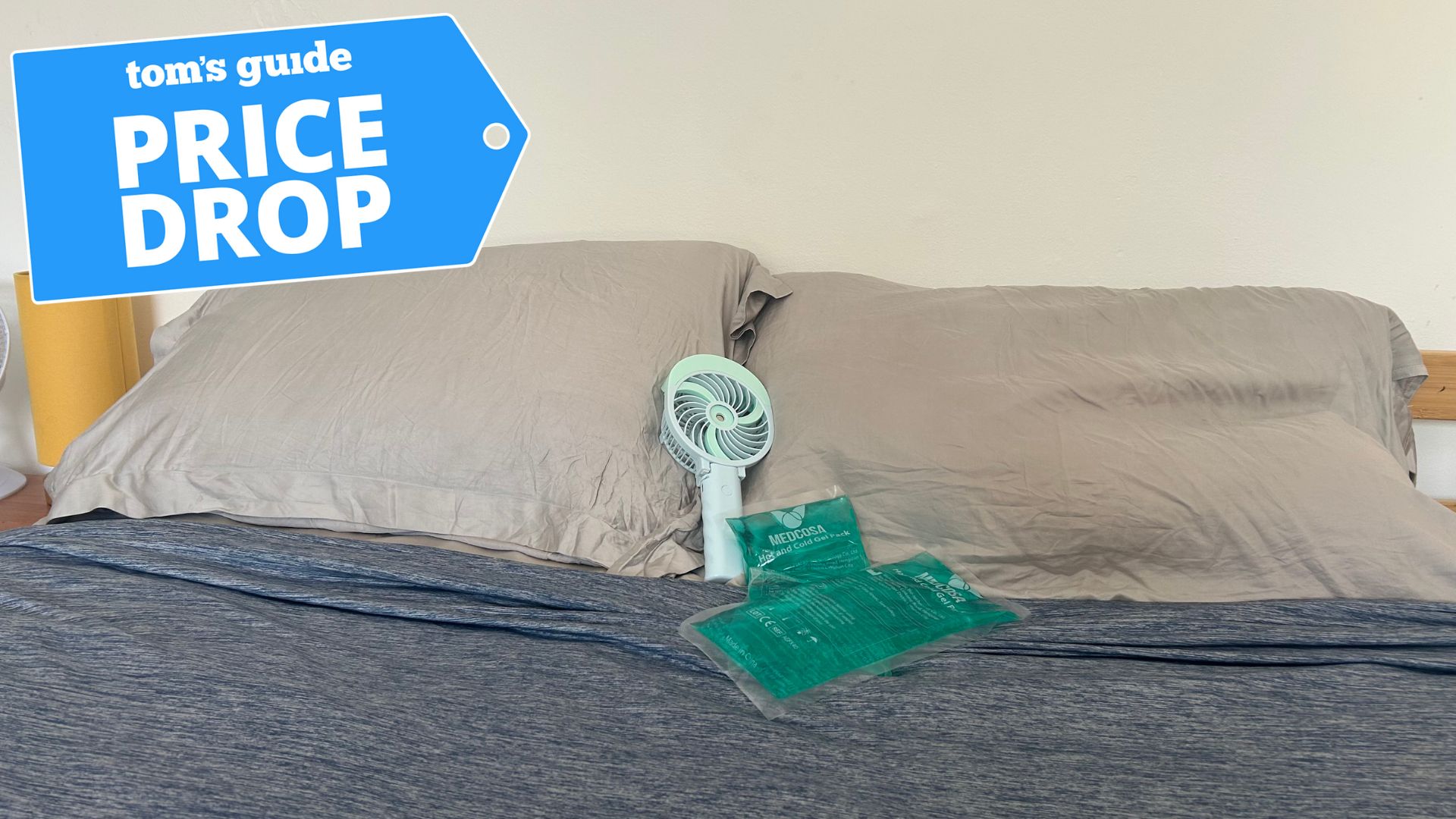 The Tom's Guide Sleep Features Editor's bed featuring a cooling fan, ice packs and cooling blanket