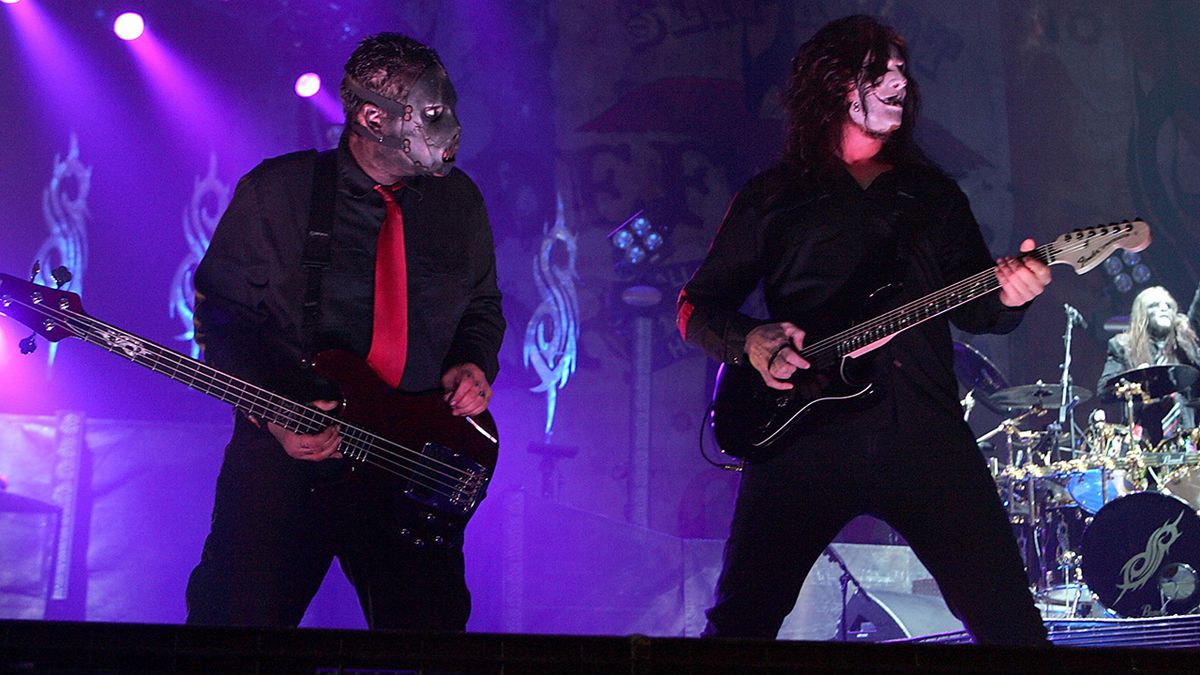 Paul Gray and Jim Root onstage with Slipknot in 2009