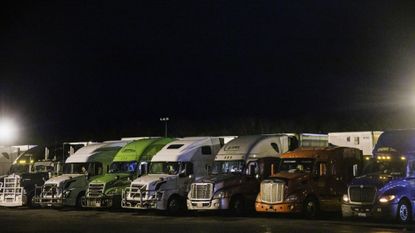 Trucks lined up for the night at a rest stop in Greencastle, Pennsylvania, on Dec. 11, 2021.