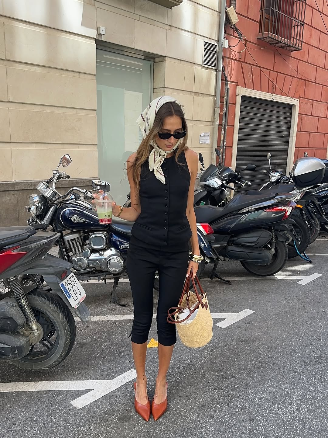 woman wearing black capri pants outfits 2025