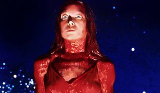 Carrie Sissy Spacek stands drenched in blood at the prom