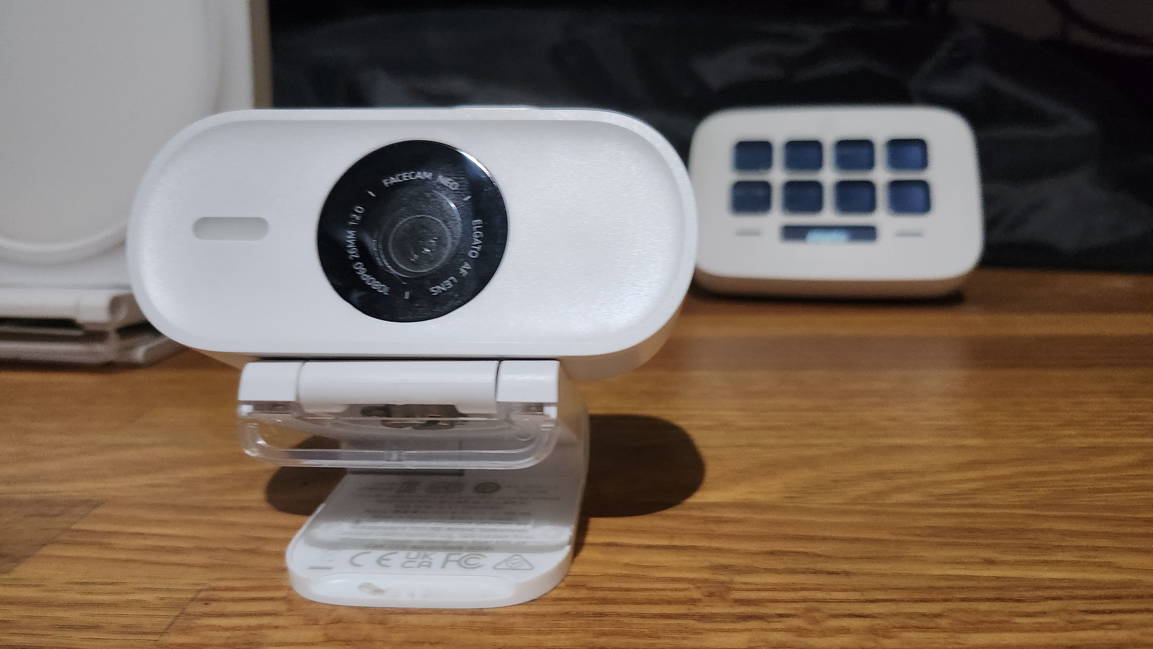 Elgato Facecam Neo placed on a desk.